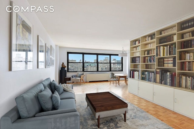 living room with light parquet floors