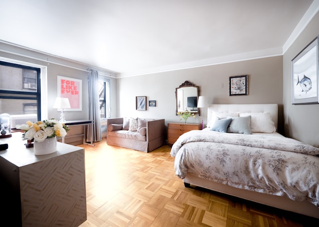 bedroom featuring crown molding