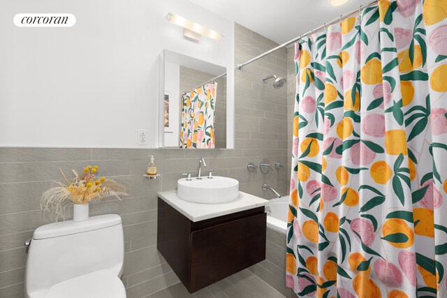 50 W 15th St Unit 2E, New York City, NY 10011 - full bathroom with vanity, tile walls, and shower / bath combination with curtain