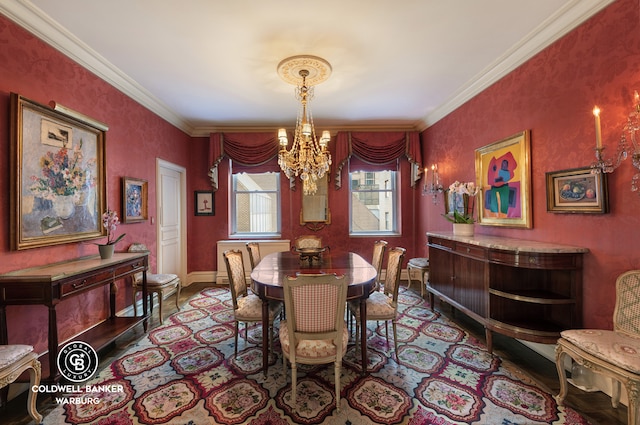 dining room featuring a chandelier, crown molding, and baseboards