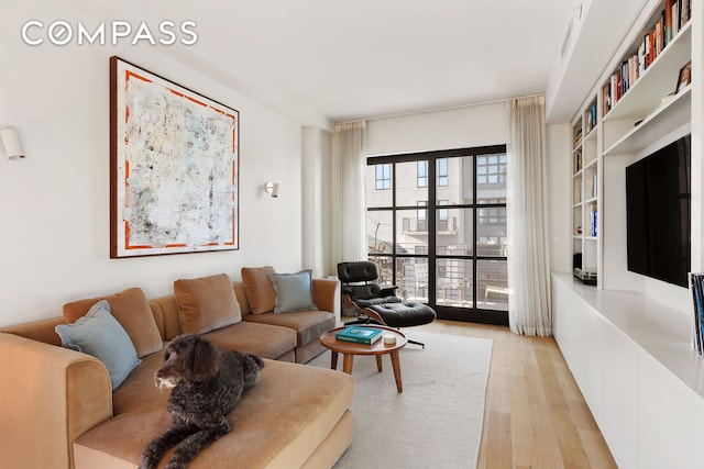 living area with wood finished floors