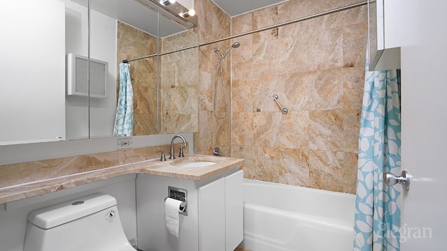 full bathroom featuring vanity, toilet, and shower / tub combo