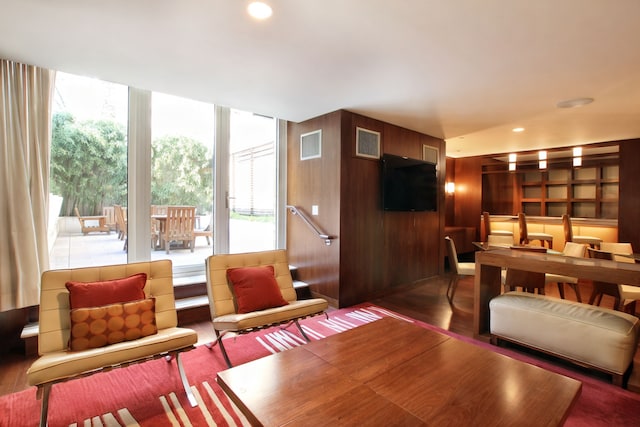 250 E 53rd St Unit 3004, New York City, NY 10022 - living room with wood finished floors and wood walls