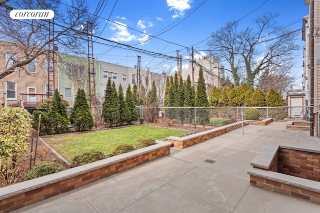 exterior space with fence and a patio