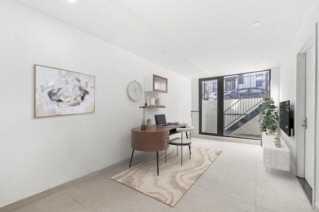 office space featuring light tile patterned floors