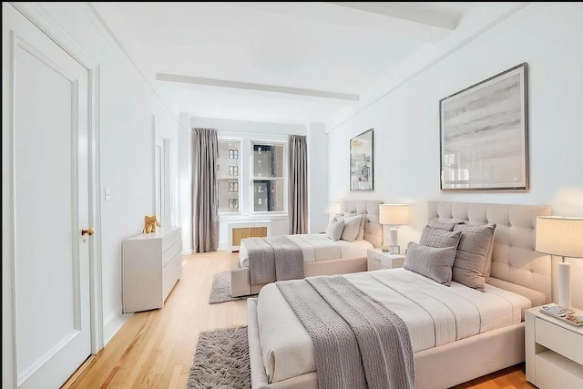 bedroom with light wood-type flooring