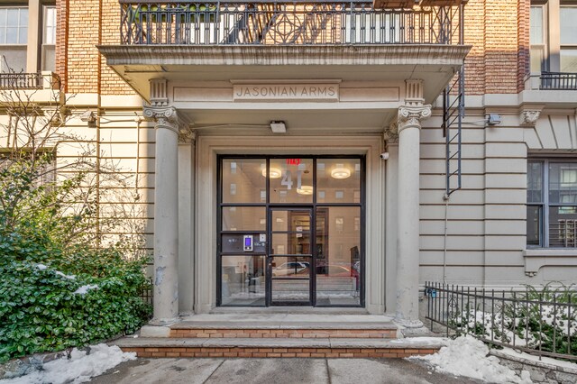 41 Clarkson Ave Unit 2E, New York City, NY 11226 - view of exterior entry with a balcony