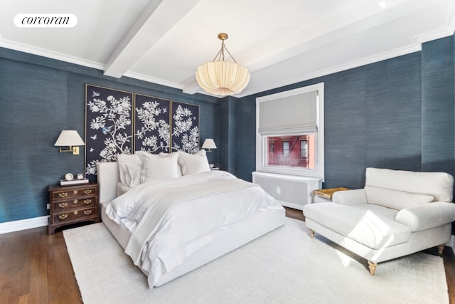 bedroom featuring beamed ceiling, crown molding, and hardwood / wood-style floors