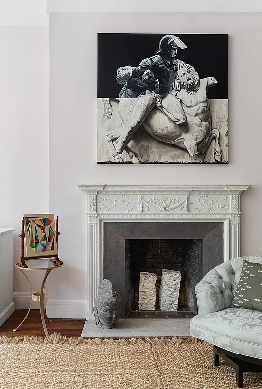 details with a fireplace with flush hearth, baseboards, and wood finished floors