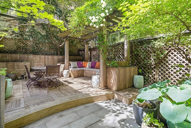 134 E 62nd St, New York City, NY 10065 - view of patio featuring outdoor dining space, a fenced backyard, a pergola, and a deck
