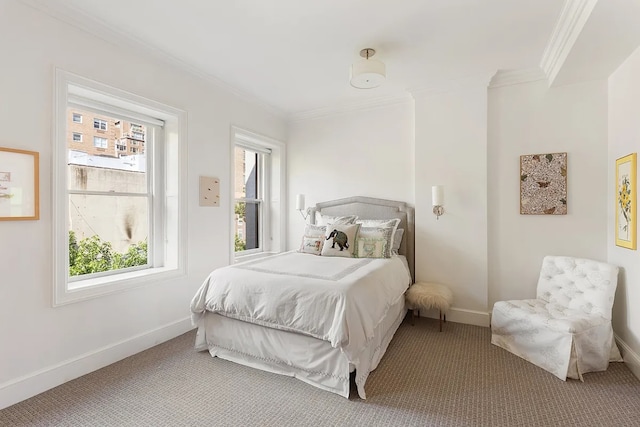 carpeted bedroom featuring multiple windows and crown molding