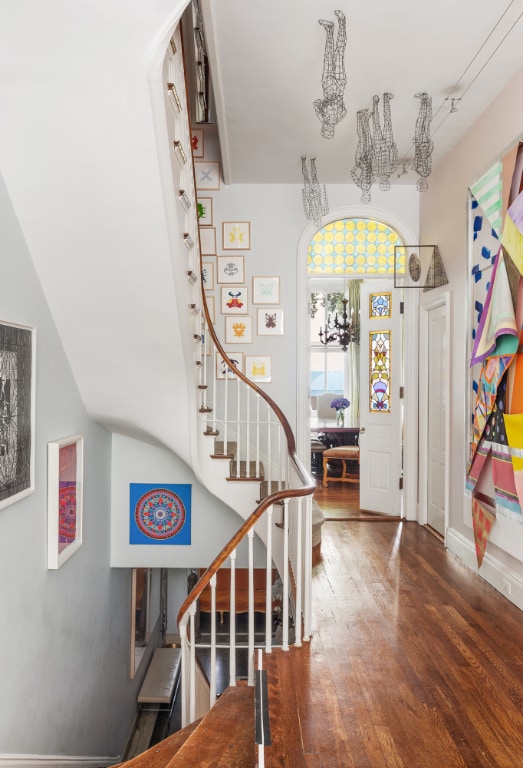 foyer entrance featuring dark wood-type flooring