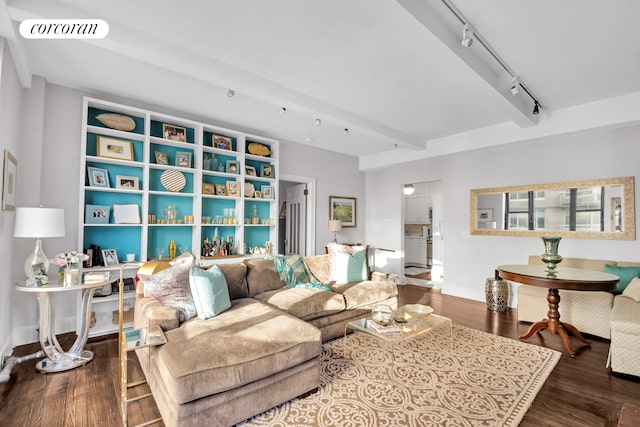 living room with beamed ceiling, wood finished floors, visible vents, and rail lighting