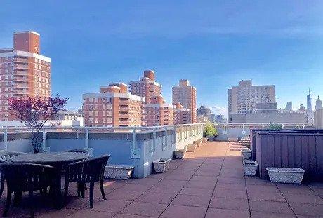 view of patio with a city view