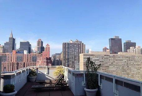 balcony featuring a city view