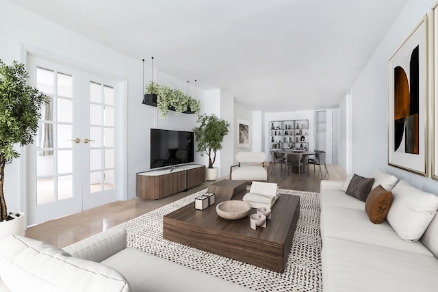 living area featuring wood finished floors and french doors