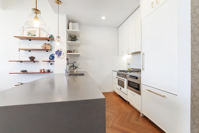 184 Kent Ave Unit B312, New York City, NY 11249 - kitchen featuring a sink, double oven range, open shelves, white cabinetry, and recessed lighting