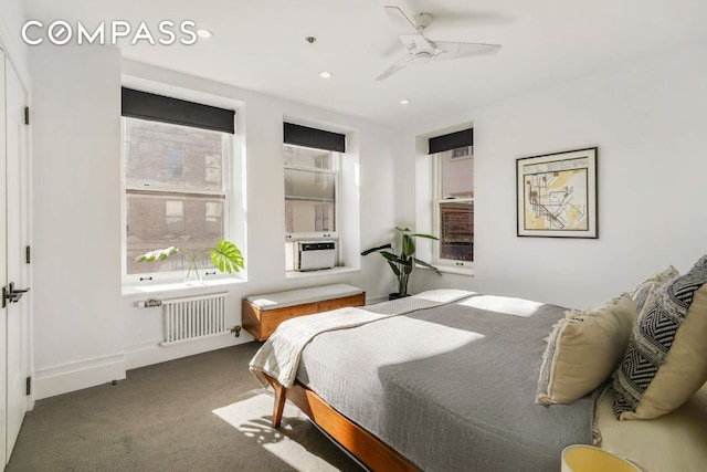 carpeted bedroom featuring radiator, baseboards, a ceiling fan, and recessed lighting