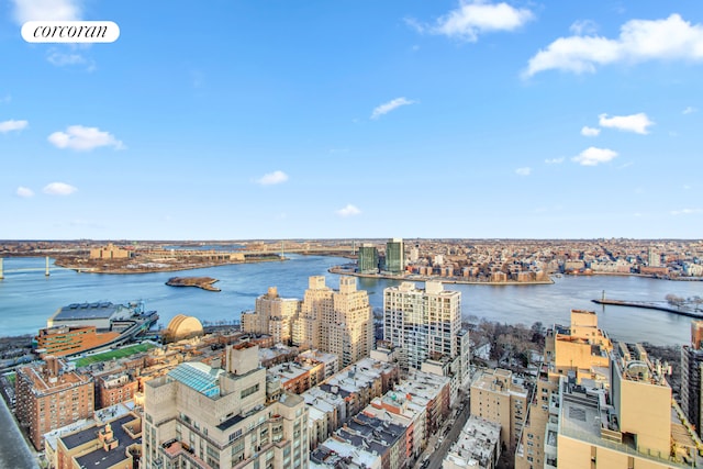 aerial view with a city view and a water view