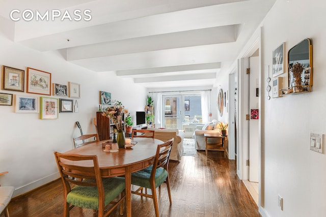 dining space featuring beam ceiling, baseboards, dark wood-style flooring, and french doors