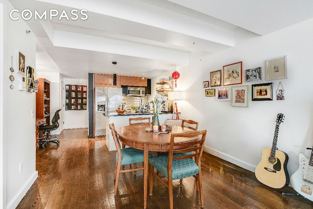 dining room featuring dark hardwood / wood-style floors