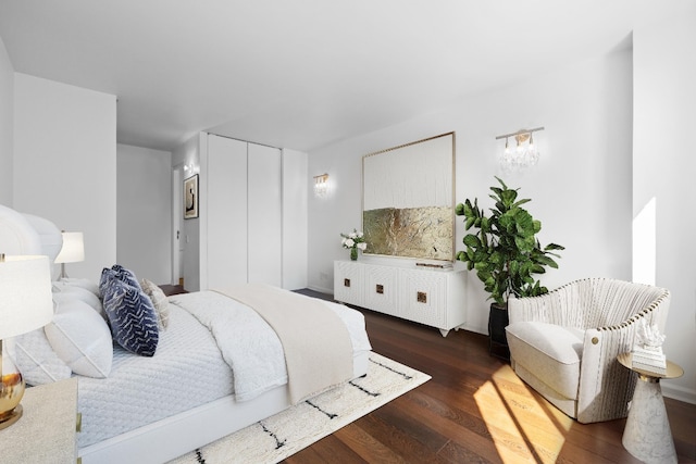 45 W 67th St Unit 27D, New York City, NY 10023 - bedroom featuring dark wood-style flooring