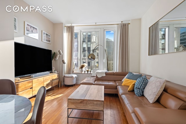 living area featuring hardwood / wood-style flooring