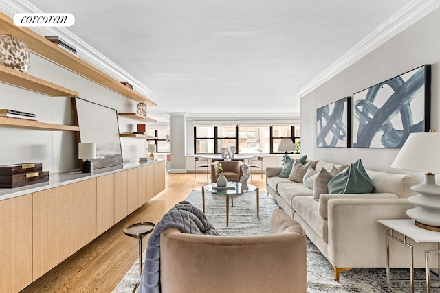 dining area with crown molding, baseboards, visible vents, and light wood-type flooring