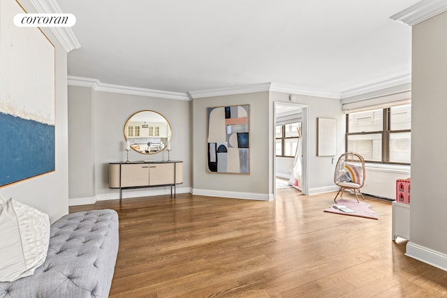 bedroom featuring baseboards, visible vents, and ornamental molding