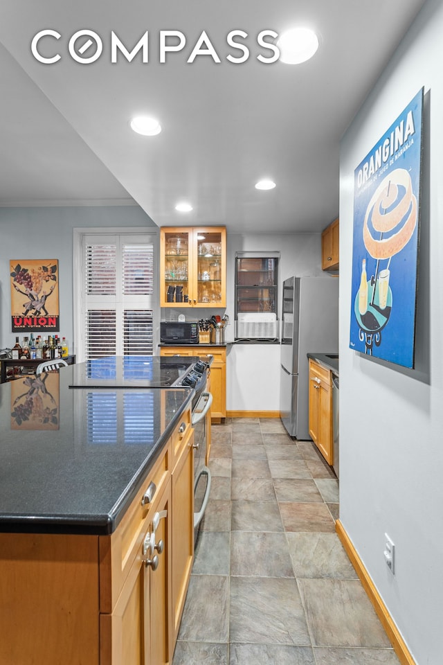 155 W 80th St Unit 4B, New York City, NY 10024 - kitchen featuring stainless steel appliances, glass insert cabinets, baseboards, stone finish flooring, and recessed lighting