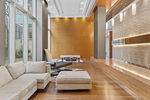 common area with a towering ceiling and recessed lighting