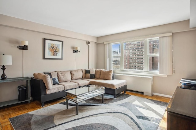 living room featuring baseboards