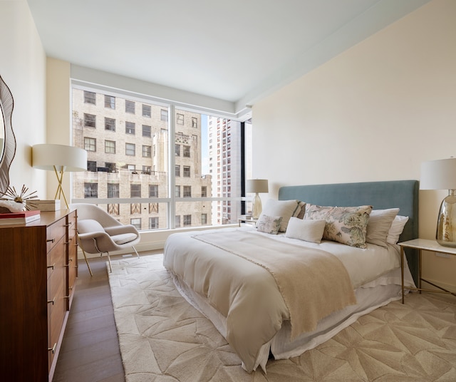 bedroom with wood finished floors