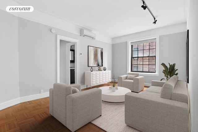 living area featuring track lighting, a wall mounted AC, visible vents, and baseboards