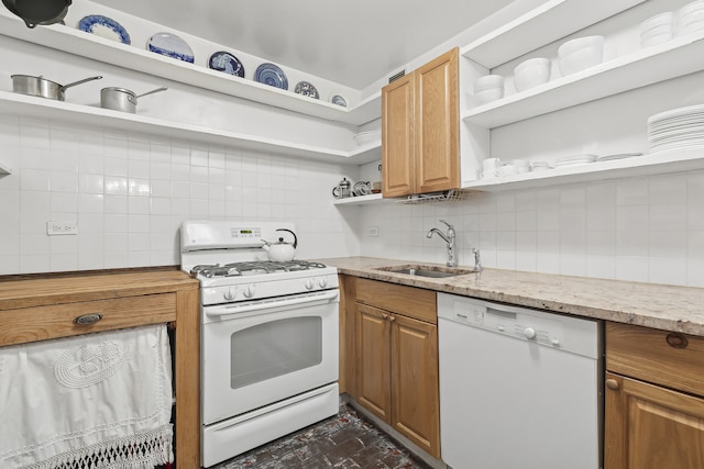 kitchen with open shelves, white appliances, a sink, tasteful backsplash, and light stone countertops