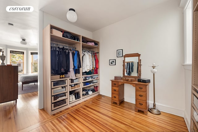 interior space with wood finished floors and visible vents