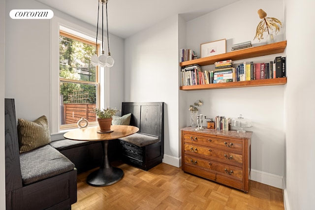 sitting room with baseboards and visible vents