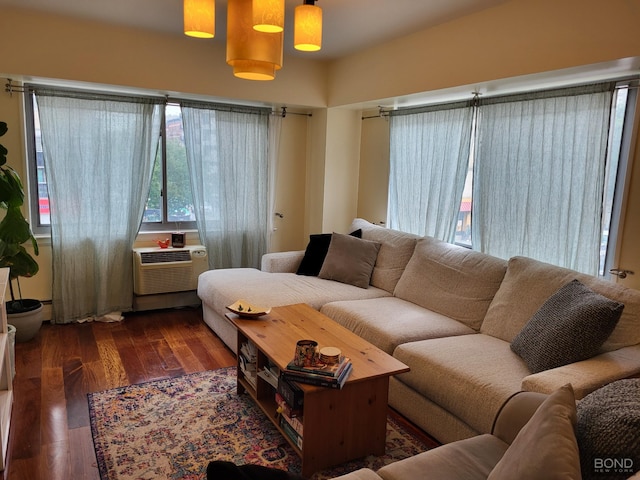 300 W 145th St Unit 1K, New York City, NY 10039 - living area featuring wood finished floors and a wall unit AC