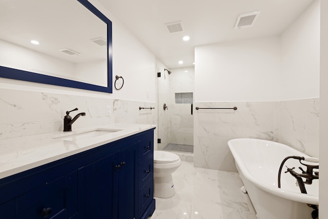 46 Clifton Place, New York City, NY 11238 - bathroom with tile walls, a marble finish shower, a freestanding bath, vanity, and marble tiled flooring