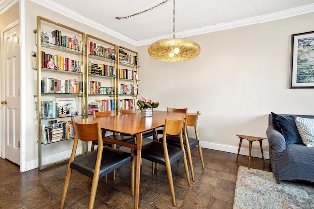 dining space with crown molding