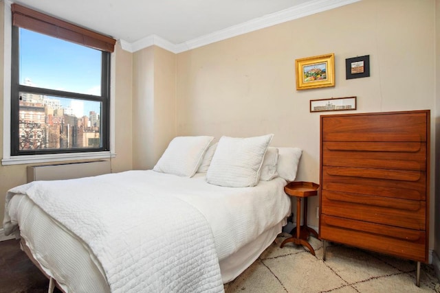 bedroom with ornamental molding