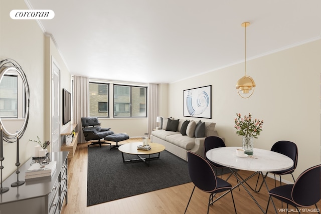 living area featuring visible vents, crown molding, and light wood-style floors