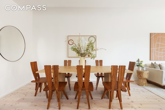 dining room with light wood finished floors