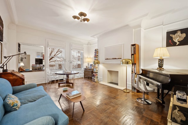 living room featuring crown molding and dark parquet floors