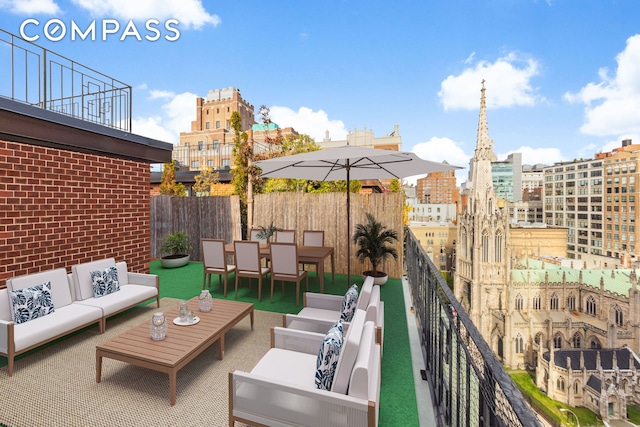 63 E 9th St Unit 14K, New York City, NY 10003 - view of patio / terrace with an outdoor living space and a city view