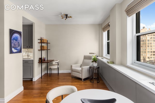 63 E 9th St Unit 14K, New York City, NY 10003 - sitting room with wood finished floors and baseboards