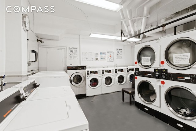 laundry area with washing machine and dryer