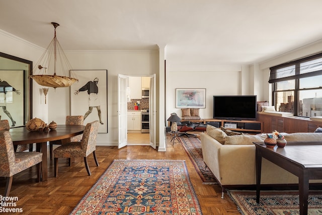 living room with ornamental molding