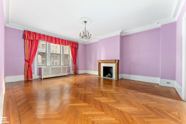 unfurnished living room with radiator, an inviting chandelier, a fireplace with flush hearth, ornamental molding, and baseboards