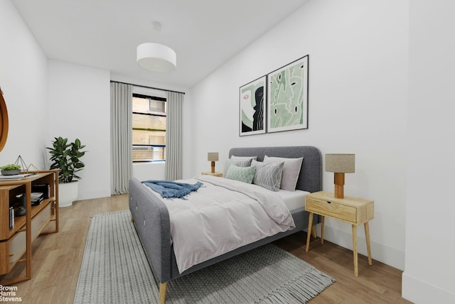 bedroom with light wood-type flooring